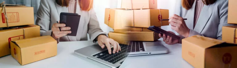 Starting a small business entrepreneur, SME, or freelance Asian woman working with boxes and laptops at home, online sales ideas,